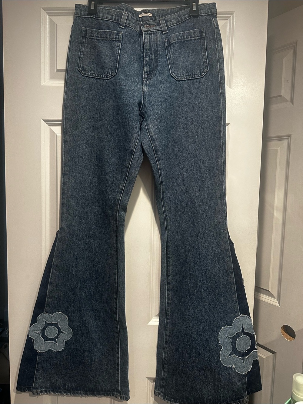 Miu Miu Indigo Flare Jeans with Flower Appliqués